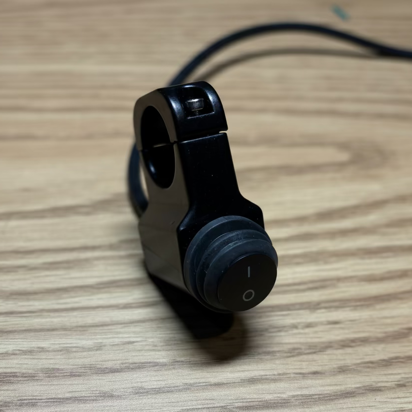 Black camera mount on a wooden surface