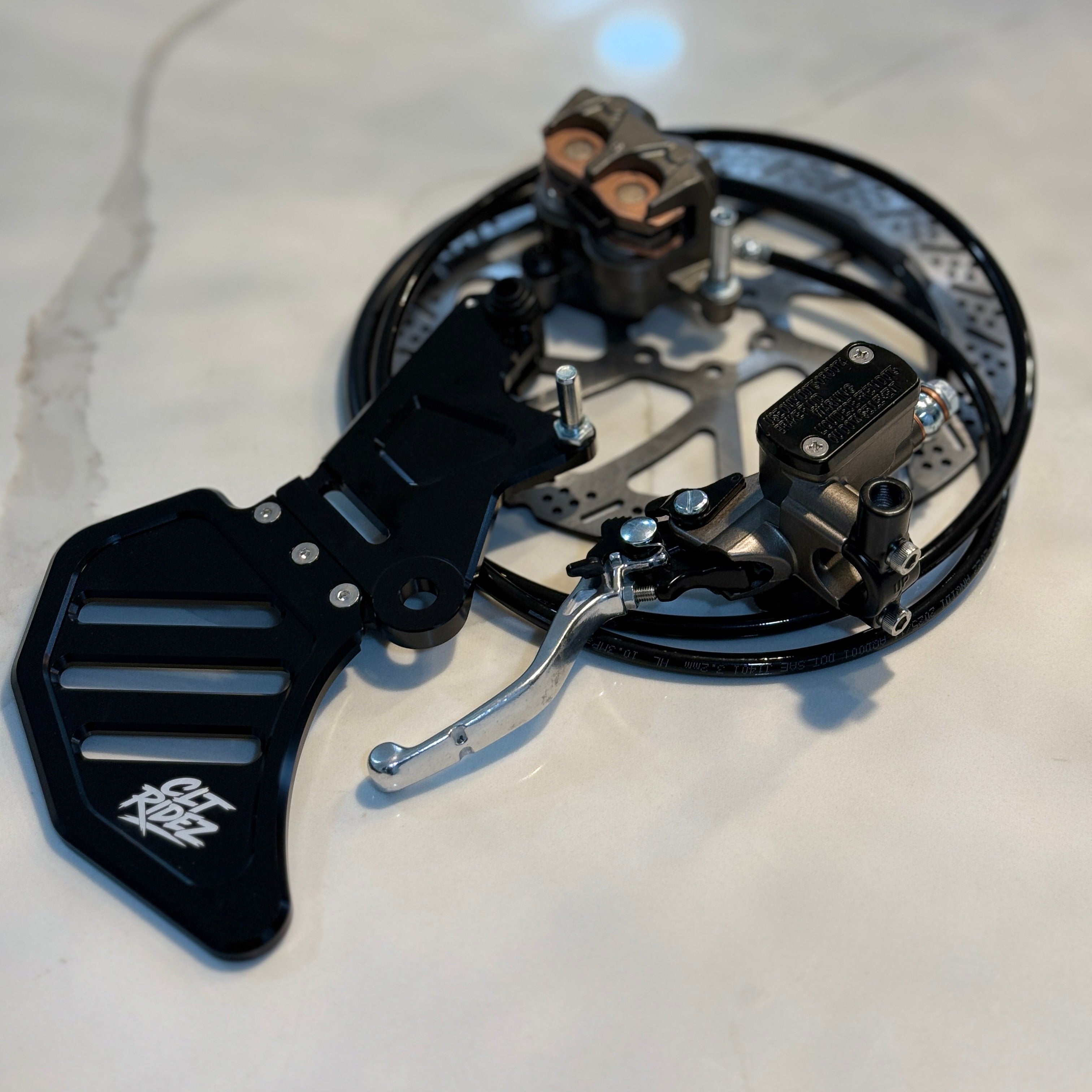 Close-up of a mechanical device on a reflective surface
