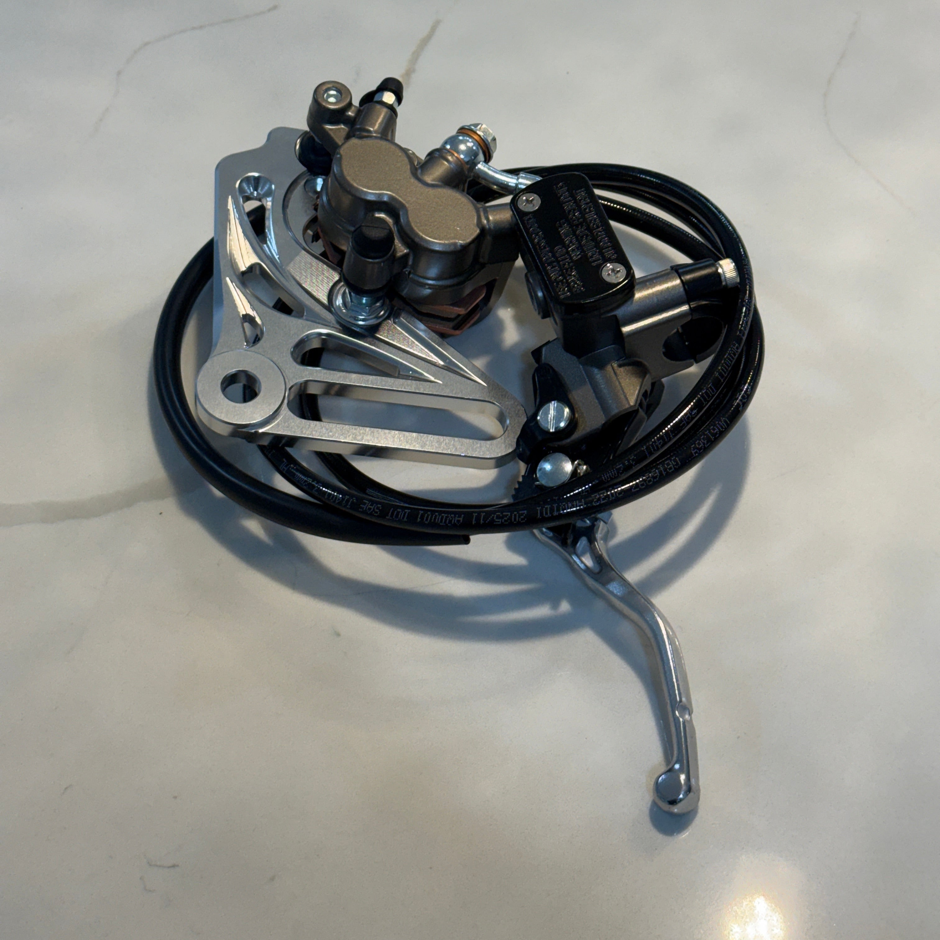 Mechanical component on a light-colored surface